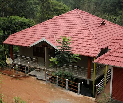 https://imgcld.yatra.com/ytimages/image/upload/t_hotel_yatra_city_desktop/v1439295761/Domestic Hotels/Hotels_Wayanad/Rest Inn Nature Resort/IMG_9105.jpg